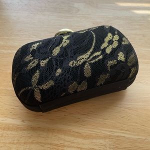 Jessica McClintock black and gold clutch